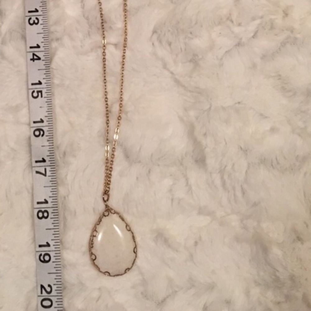Donated Last day. 2/$5. White Stone Pendant